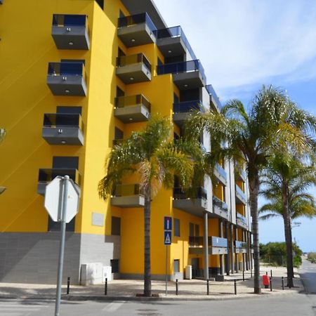 Apartamento Frente Ao Mar Com Piscina De Agua Salgada Quarteira Buitenkant foto