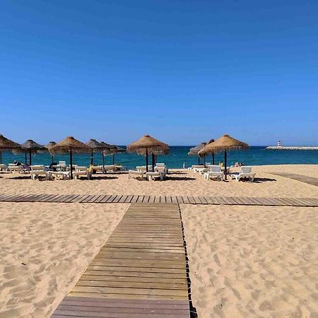 Apartamento Frente Ao Mar Com Piscina De Agua Salgada Quarteira Buitenkant foto