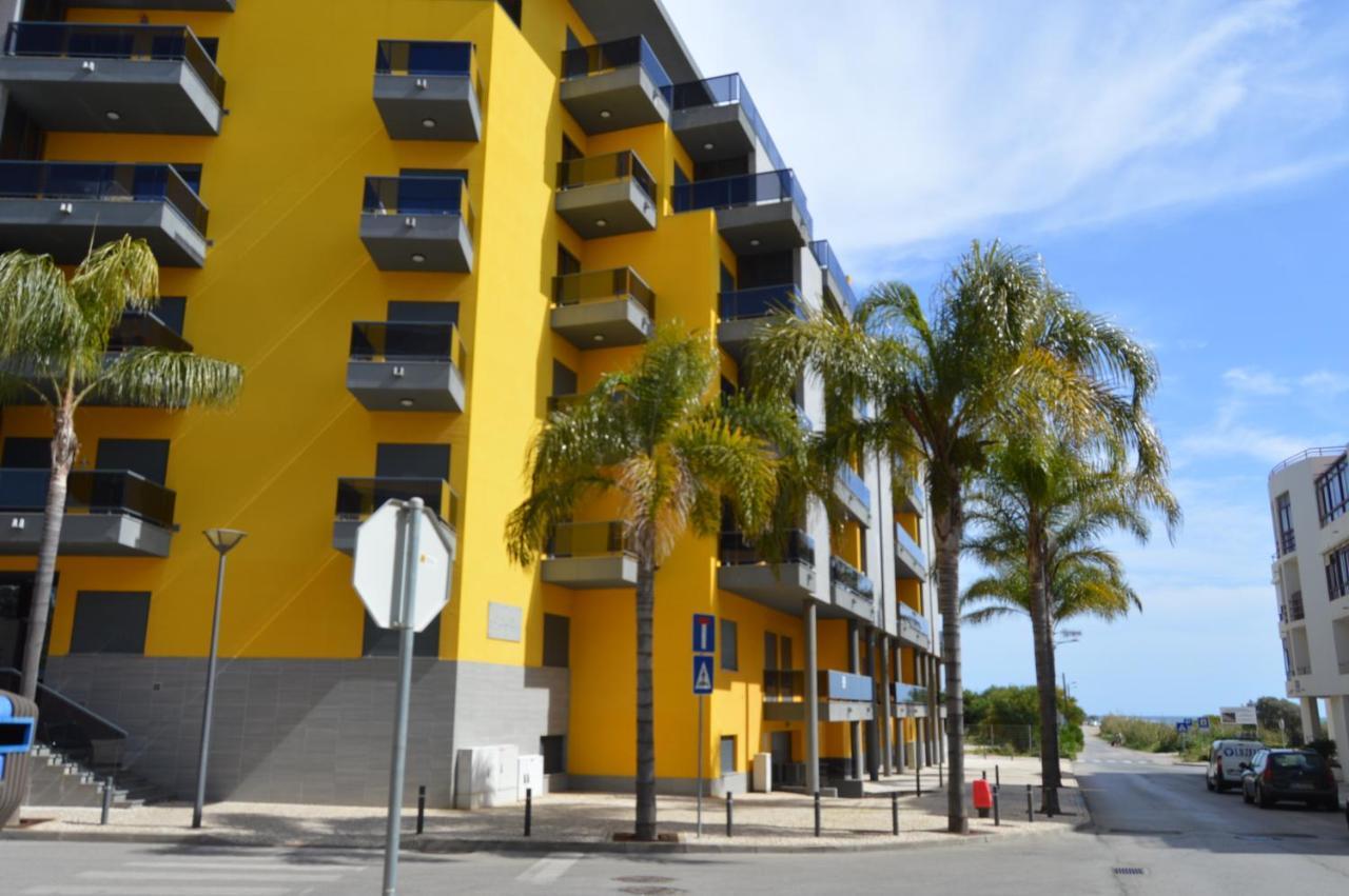 Apartamento Frente Ao Mar Com Piscina De Agua Salgada Quarteira Buitenkant foto