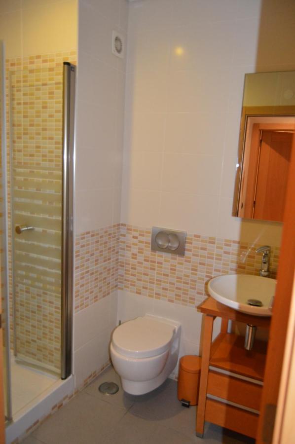Apartamento Frente Ao Mar Com Piscina De Agua Salgada Quarteira Buitenkant foto