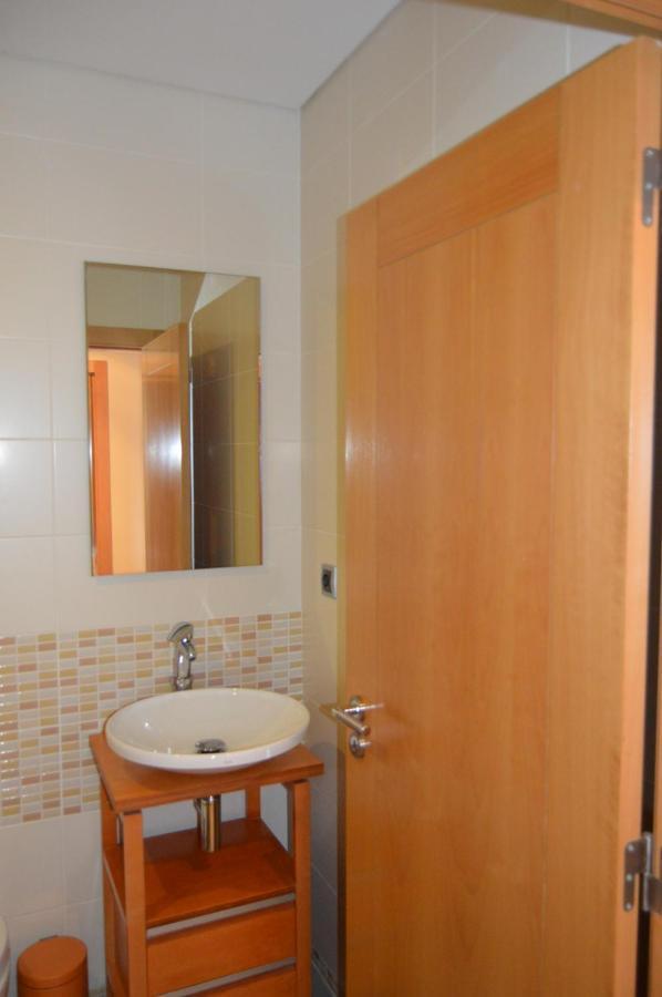 Apartamento Frente Ao Mar Com Piscina De Agua Salgada Quarteira Buitenkant foto
