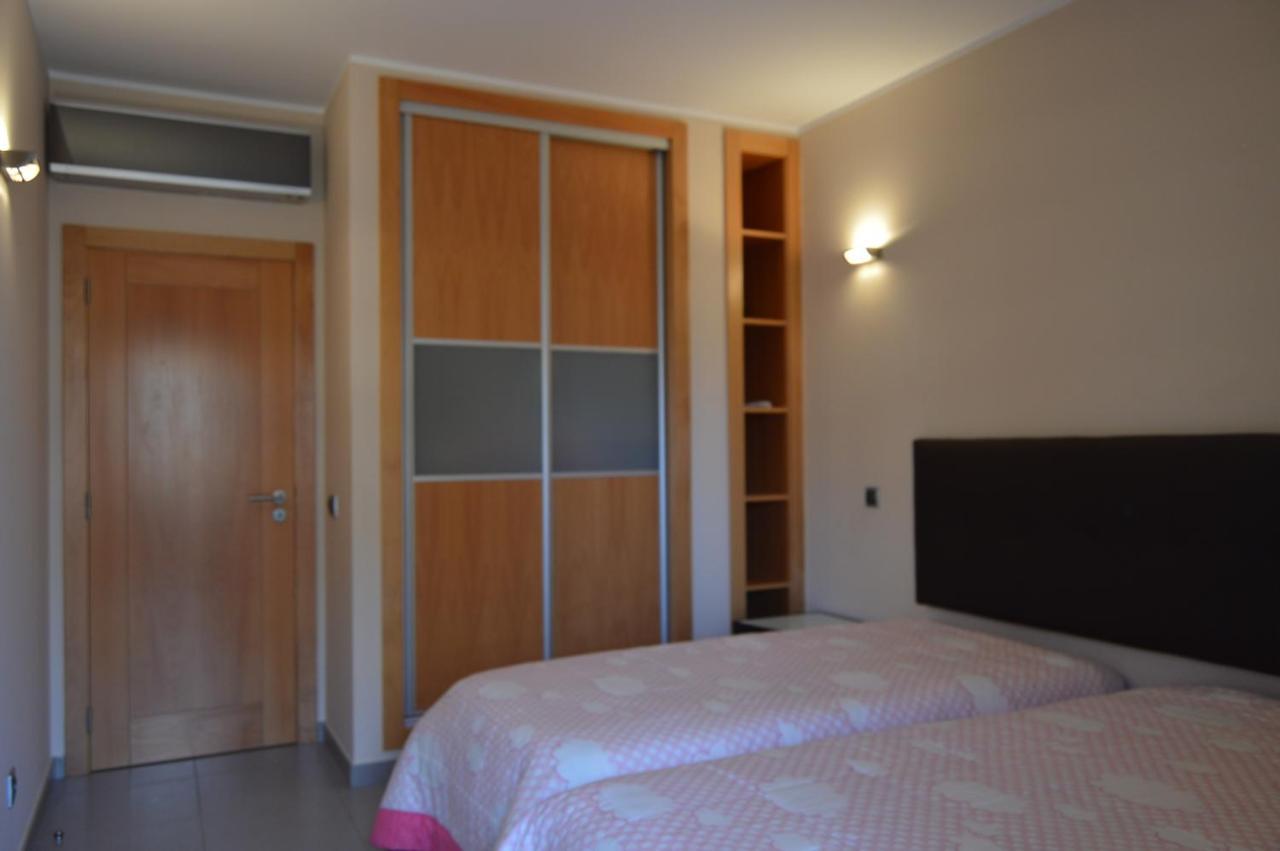 Apartamento Frente Ao Mar Com Piscina De Agua Salgada Quarteira Buitenkant foto