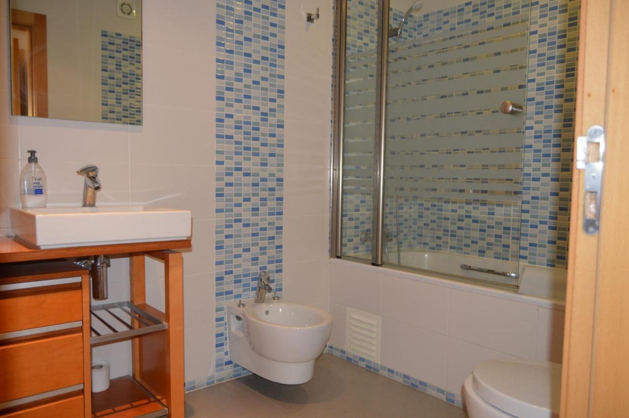 Apartamento Frente Ao Mar Com Piscina De Agua Salgada Quarteira Buitenkant foto